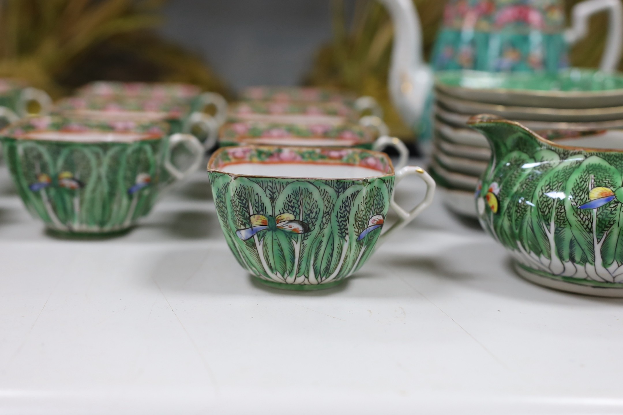 A Chinese pakchoi cabbage pattern set of tea cups and saucers, others similar, Republic period